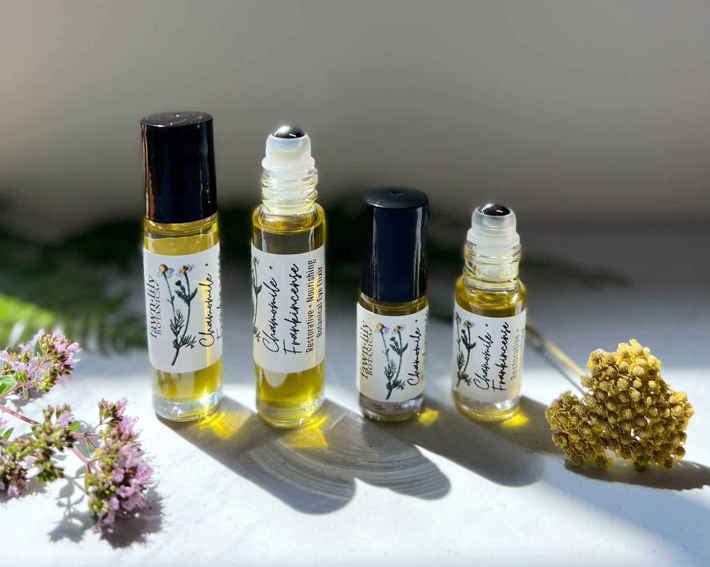 Nourishing Chamomile + Frankincense Botanical Eye Elixir | Fawn Lily Botanica. Revitalize the skin around your eyes with our Nourishing Botanical Eye Elixir. Plant-based eye oil to nourish, moisturize, firm, protect, repair.