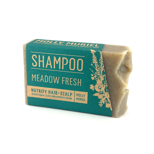 Zero waste all natural shampoo bar with herbs from Molly Muriel.